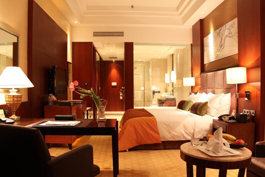 Celebrity City Hotel Chengdu Quarto foto